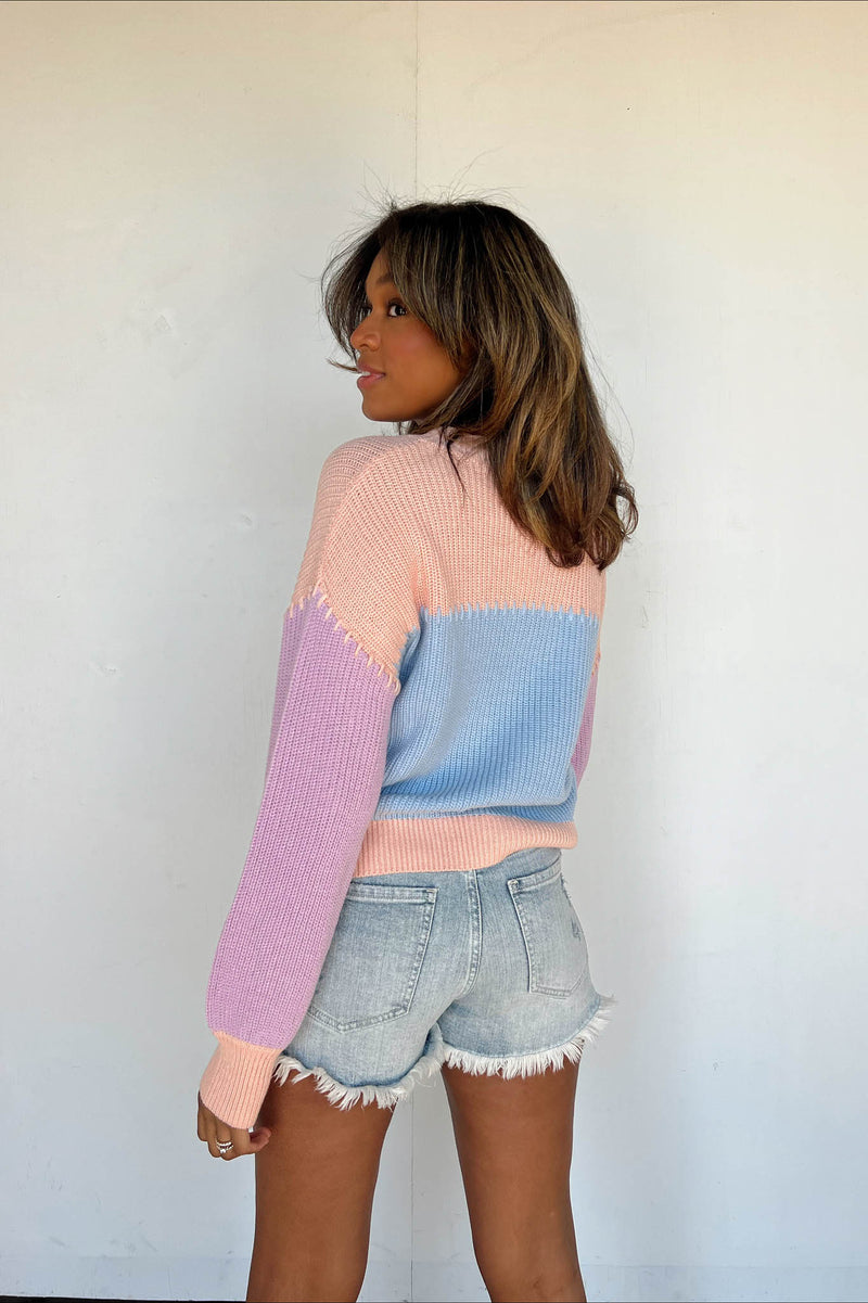 peach lavender pastel sweater