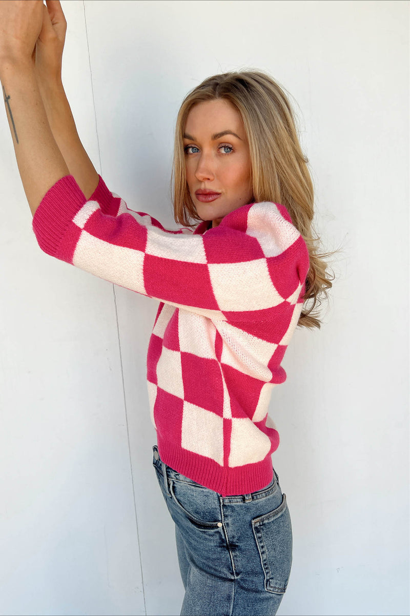 pink checkered design and puff sleeve