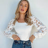 white knit body with lace sleeves