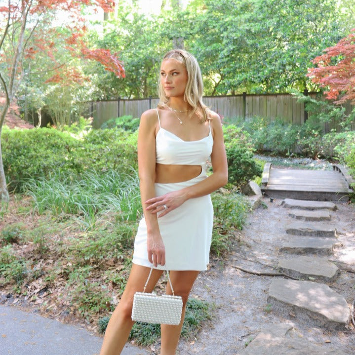 white mini dress with side cut out