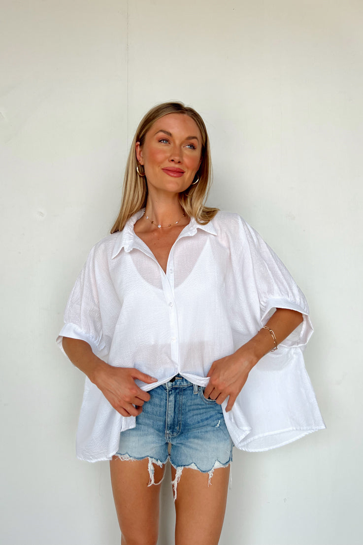 white short sleeve sheer button up