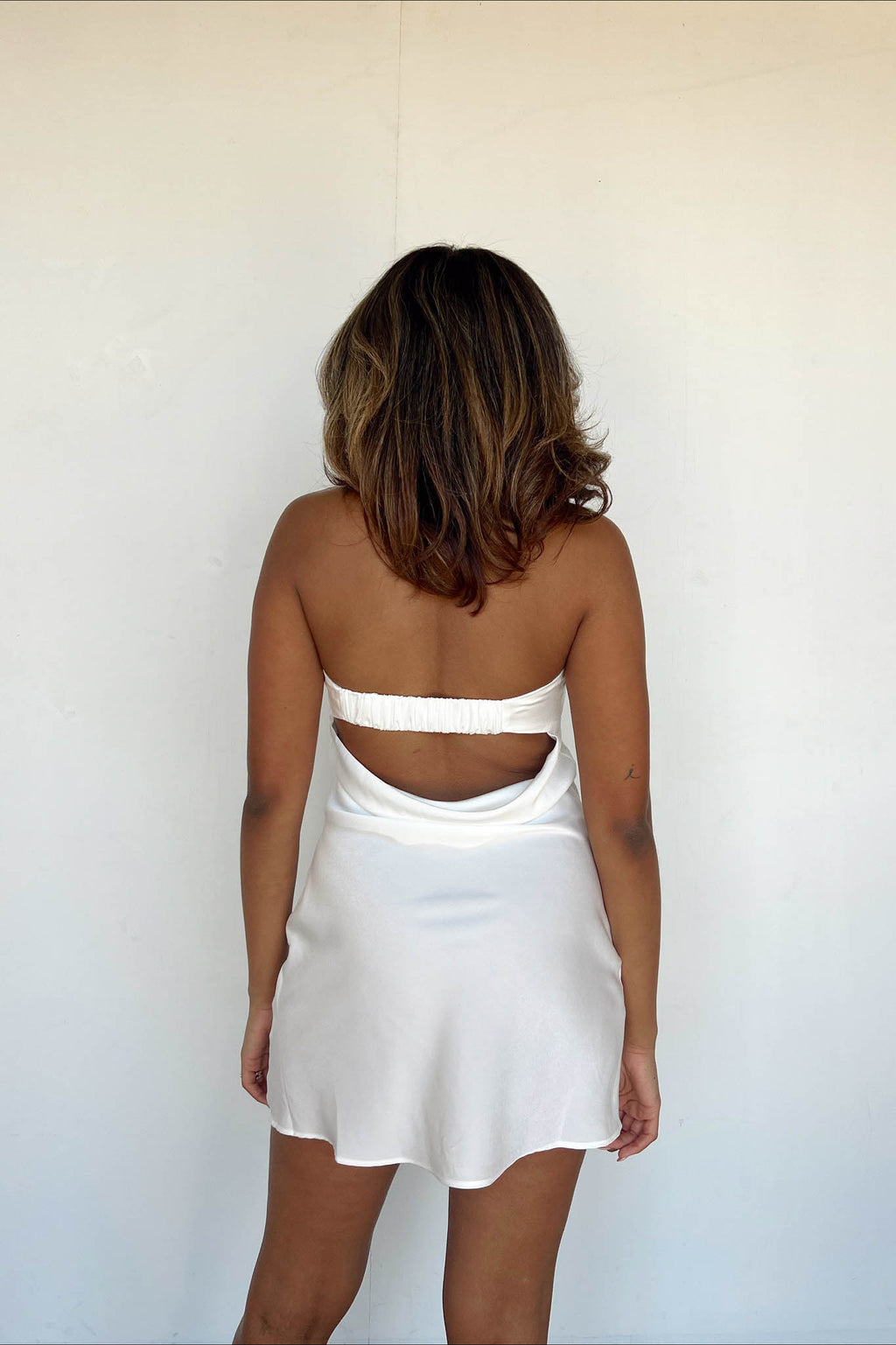 white strapless satin mini dress